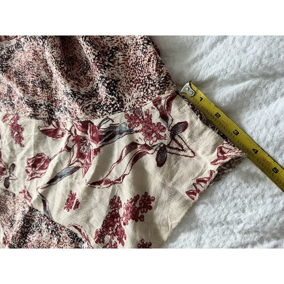 Free People Isabella Mixed Print Romper Cross Back Tie Details Flowy size Large - Picture 11 of 12